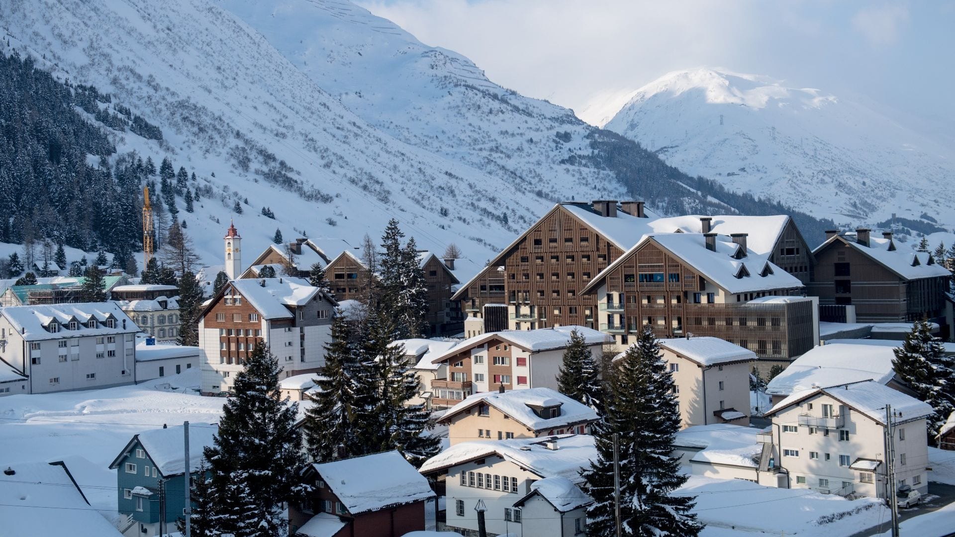 A Group Of Buildings In A Snowy Area With_yy